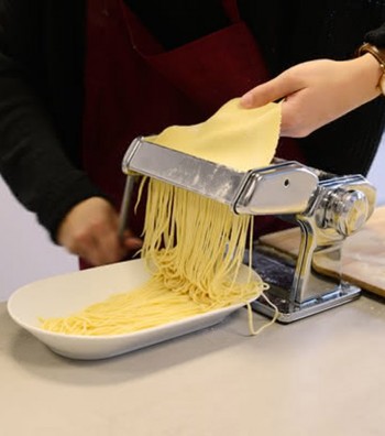 Steel pasta machine ''Atlas'' doing fettuccine