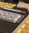 Detailed black ravioli tablet on a table